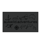 AWA Graphic illustrated travel patch design featuring Aus Wild Adventures lettering surrounded by Uluru, a 4WD, kangaroos, compass, gum leaves and an Australia outline.