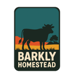 Barkly Homestead illustrated travel patch design featuring dark cattle silhouette against orange outback hills and a teal sky.