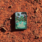 Berry Springs embroidered travel patch featuring swimmers in turquoise water beside a waterfall and lush tropical palms.