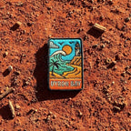 Byron Bay embroidered travel patch with Cape Byron Lighthouse above the coast.