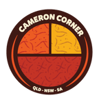 Cameron's Corner illustrated travel patch design featuring a survey marker in the red outback at Cameron Corner.