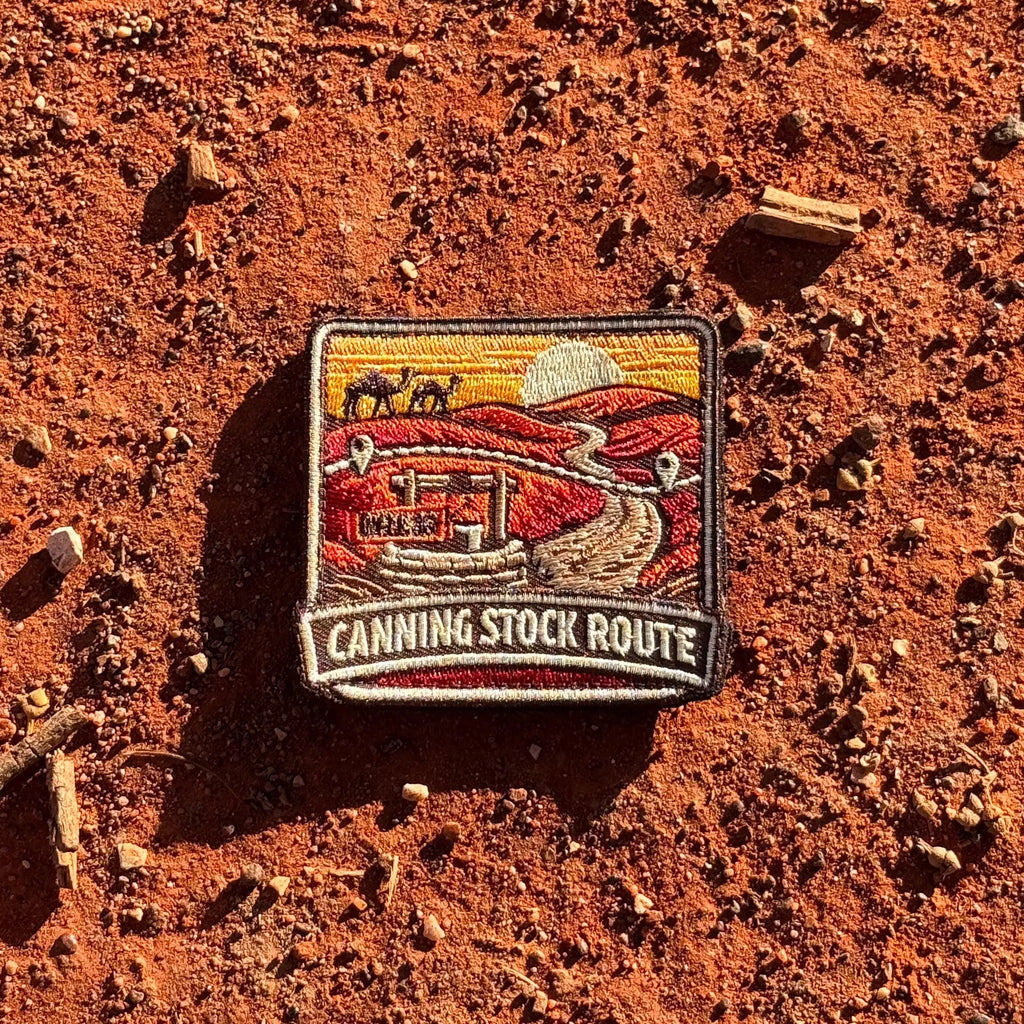 Canning Stock Route embroidered travel patch with a four-wheel drive on a remote outback track.