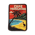 Cape Tribulation embroidered travel patch with rainforest meeting a tropical beach; photographed on a transparent background.
