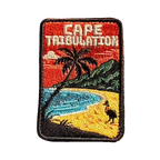 Cape Tribulation embroidered travel patch with rainforest meeting a tropical beach; photographed on a transparent background.