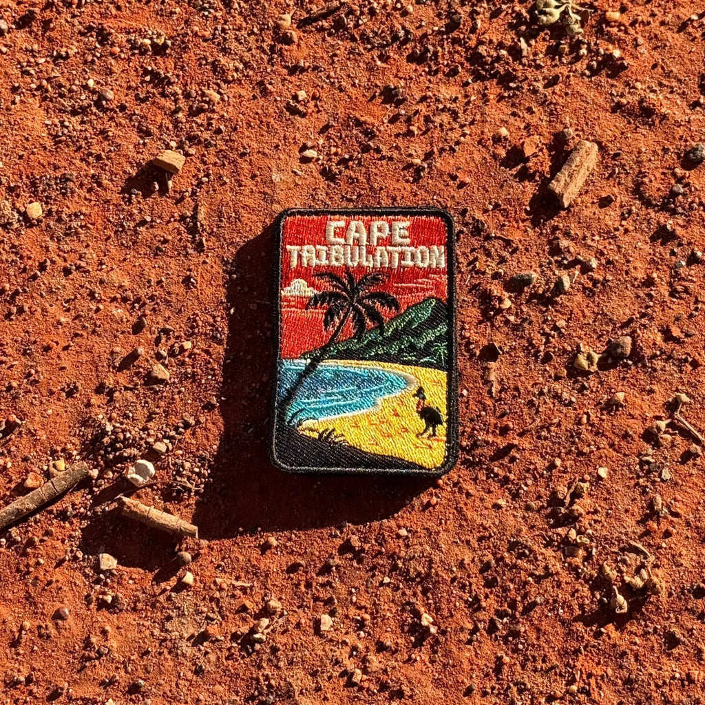 Cape Tribulation embroidered travel patch with rainforest meeting a tropical beach.