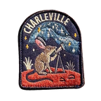 Charleville embroidered travel patch with an outback night sky filled with stars; photographed on a transparent background.