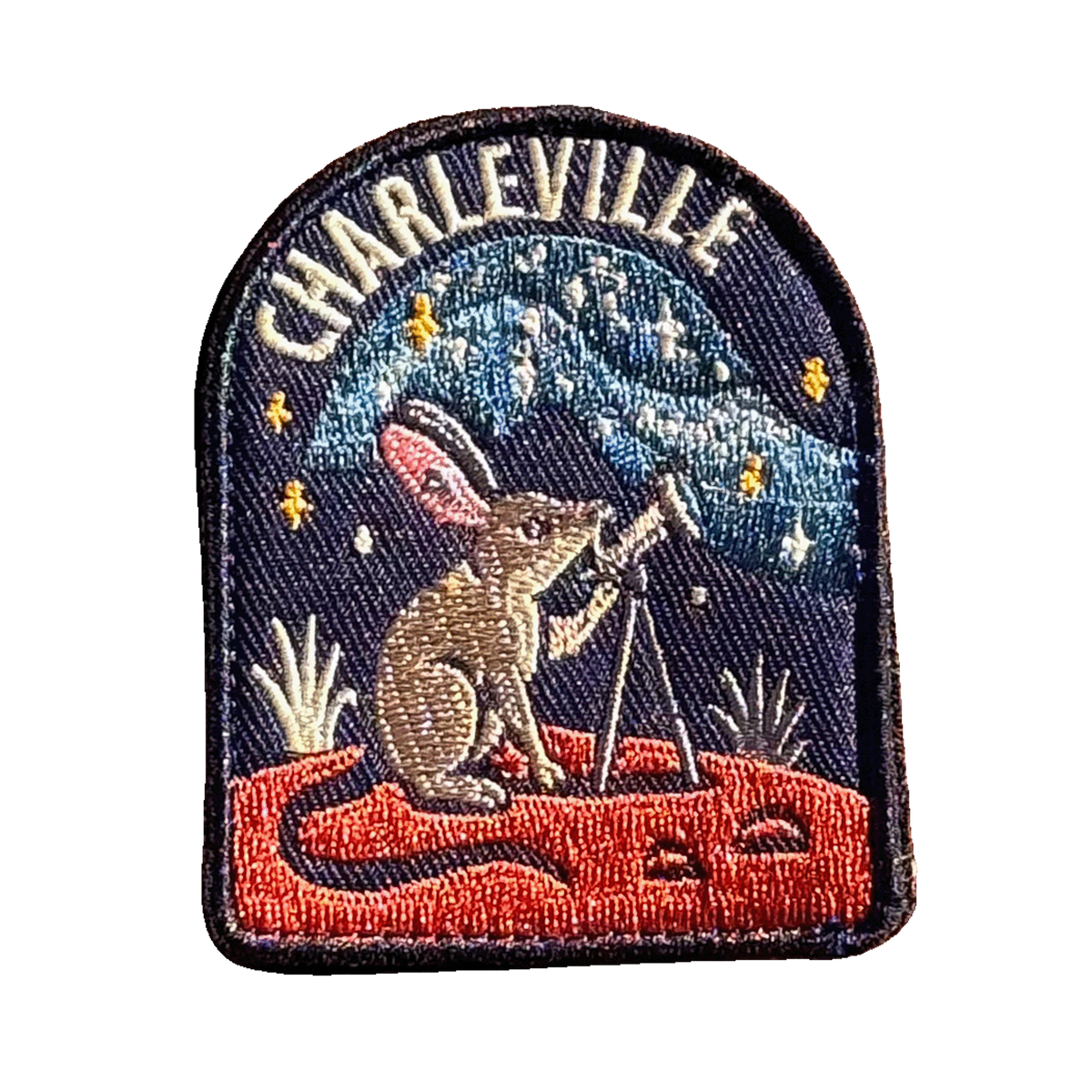 Charleville embroidered travel patch with an outback night sky filled with stars; photographed on a transparent background.