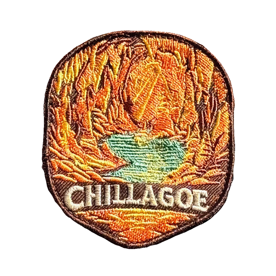 Chillagoe embroidered travel patch with limestone formations and tropical bushland; photographed on a transparent background.