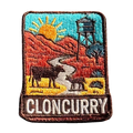 Cloncurry embroidered travel patch with red outback scenery and a mining landscape; photographed on a transparent background.