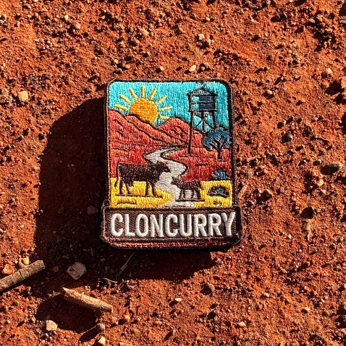 Cloncurry embroidered travel patch with red outback scenery and a mining landscape.