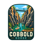 Cobbold Gorge illustrated travel patch design featuring a boat travelling between narrow sandstone gorge walls.