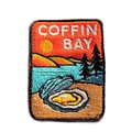 Coffin Bay embroidered travel patch with a white sandy beach and turquoise coastline; photographed on a transparent background.