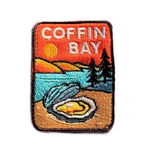 Coffin Bay embroidered travel patch with a white sandy beach and turquoise coastline; photographed on a transparent background.