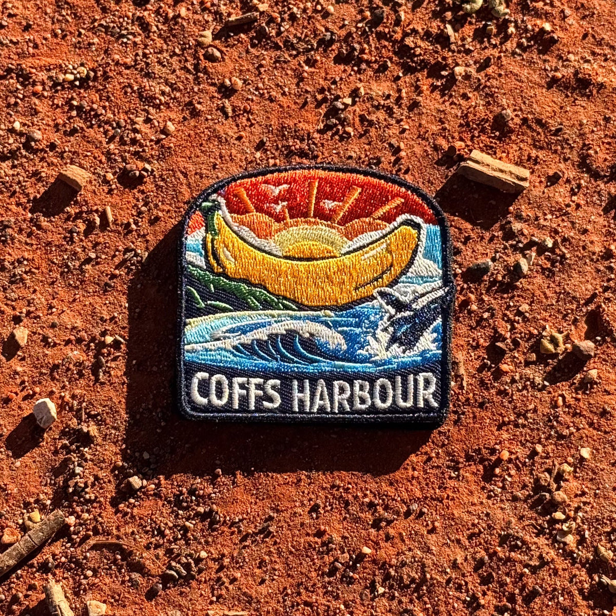 Coffs Harbour embroidered travel patch with the Big Banana landmark.