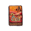 Coober Pedy embroidered travel patch with an opal-mining and underground dugout landscape; photographed on a transparent background.