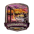 Cunnamulla - Charlotte Plains embroidered travel patch with a person relaxing in an outdoor bath at Charlotte Plains beneath a sunset sky; photographed on a transparent background.