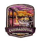 Cunnamulla - Charlotte Plains embroidered travel patch with a person relaxing in an outdoor bath at Charlotte Plains beneath a sunset sky; photographed on a transparent background.