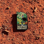 Daintree Rainforest embroidered travel patch with a cassowary surrounded by tropical rainforest, palms and flowers.