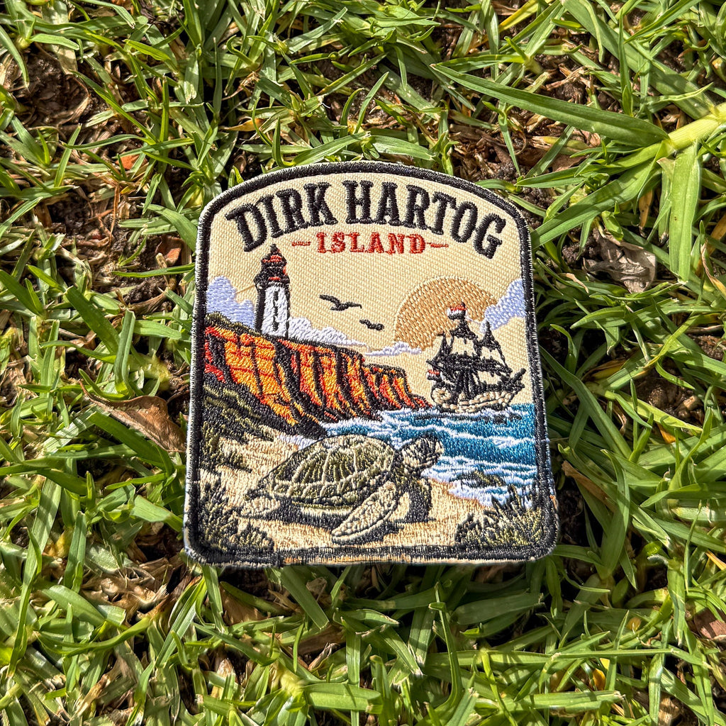 Dirk Hartog Island embroidered travel patch with a lighthouse on a rugged island coast.