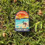 Esperance - Lucky Bay embroidered travel patch with a kangaroo on the white sand of Lucky Bay beside turquoise water.