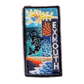 Exmouth embroidered travel patch with a whale shark swimming through blue ocean; photographed on a transparent background.