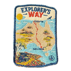 Explorers Way embroidered travel patch with an outback road through red desert country; photographed on a transparent background.
