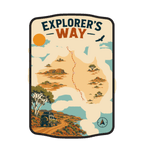 Explorers Way illustrated travel patch design featuring an outback road through red desert country.