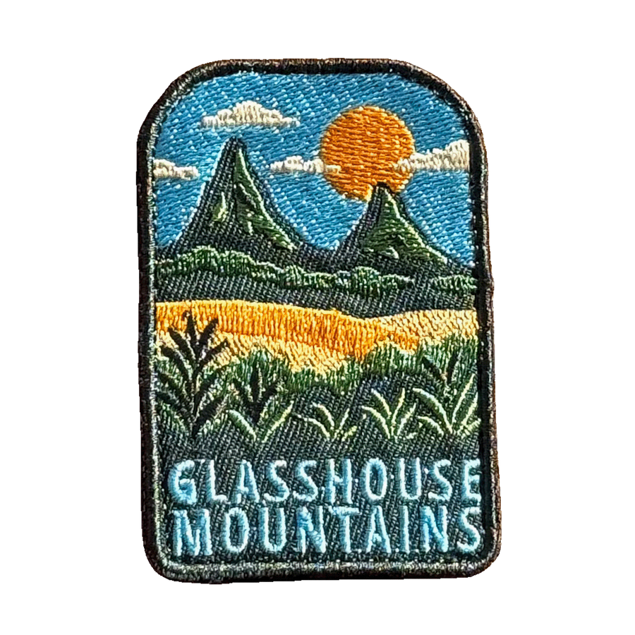 Glass House Mountains embroidered travel patch with the distinctive Glass House Mountains; photographed on a transparent background.
