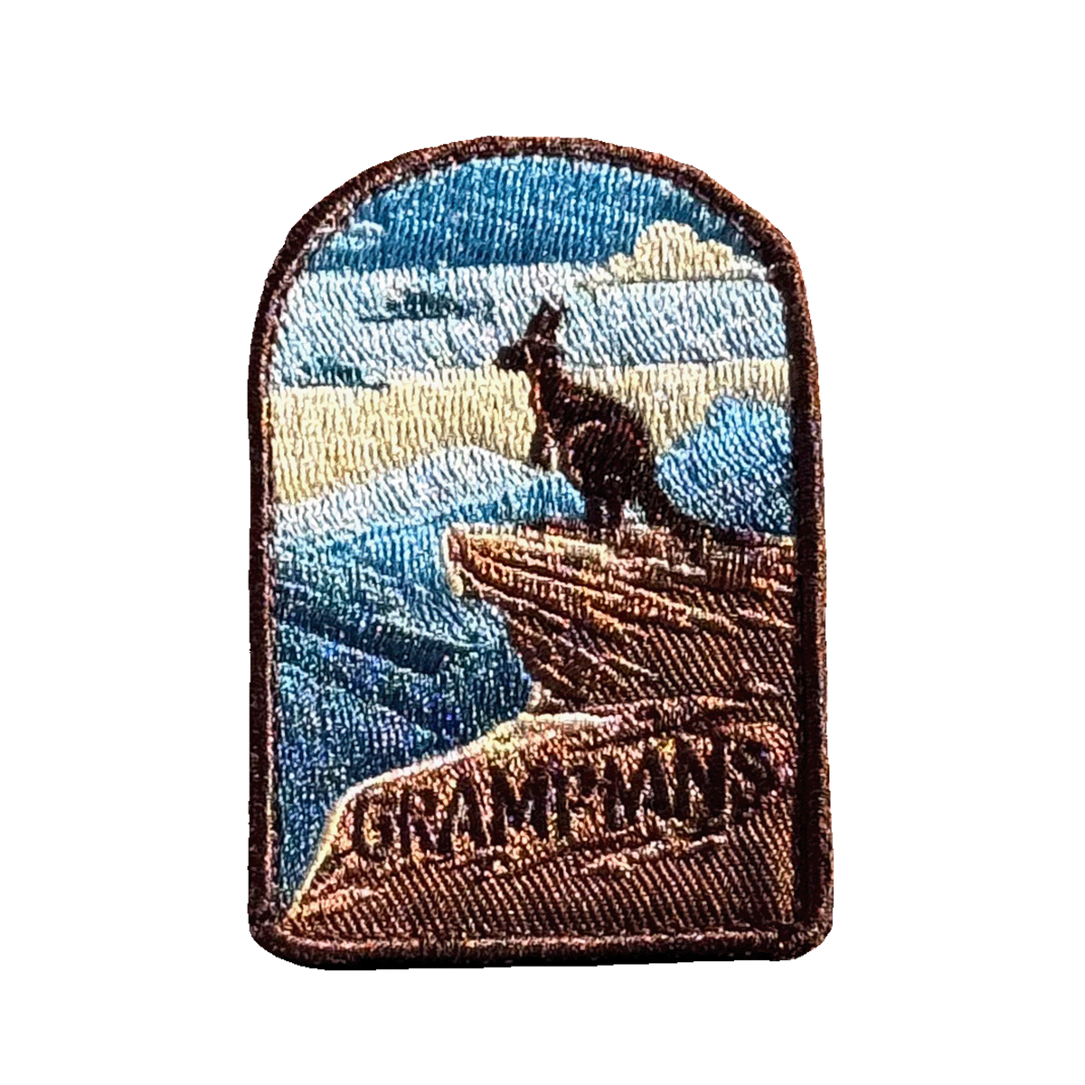 Grampians embroidered travel patch with sandstone mountains and forested valleys; photographed on a transparent background.