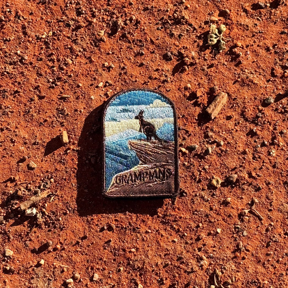 Grampians embroidered travel patch with sandstone mountains and forested valleys.
