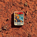 Great Ocean Road embroidered travel patch with the Twelve Apostles sea stacks beside the ocean.