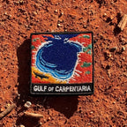 Gulf of Carpentaria embroidered travel patch with a barramundi and tropical coastline.
