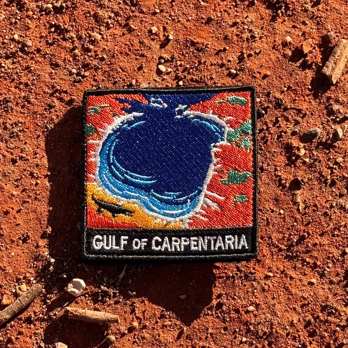 Gulf of Carpentaria embroidered travel patch with a barramundi and tropical coastline.
