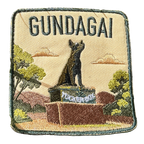 Gundagai embroidered travel patch with the Dog on the Tuckerbox monument; photographed on a transparent background.