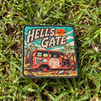 Hells Gate embroidered travel patch with a rusty outback vehicle beside an 11 km sign at Hells Gate.