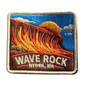 Hyden - Wave Rock embroidered travel patch with the curved rock formation of Wave Rock; photographed on a transparent background.