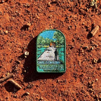 Kakadu - Cahills Crossing embroidered travel patch with a four-wheel drive approaching a river crossing in Kakadu, with trees and a person fishing.