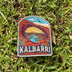 Kalbarri embroidered travel patch with a red sandstone arch framing a winding river through an outback gorge.