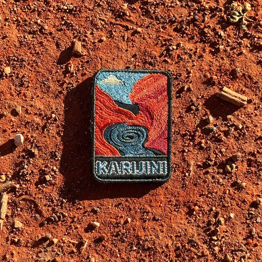 Karijini - Hamersley Gorge embroidered travel patch with red gorge walls surrounding a swirling turquoise pool.