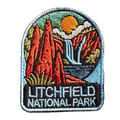 Litchfield National Park embroidered travel patch with red termite mounds, a waterfall and rocky scenery in Litchfield National Park; photographed on a transparent background.
