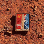 Nullarbor Plain embroidered travel patch with the 90 Mile Straight road between red desert with a camel and coastal cliffs with a whale.