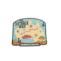 Outback Way embroidered travel patch with a map of Australia showing the Laverton to Winton route and Uluru; photographed on a transparent background.