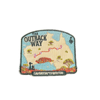 Outback Way embroidered travel patch with a map of Australia showing the Laverton to Winton route and Uluru; photographed on a transparent background.