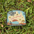 Outback Way embroidered travel patch with a map of Australia showing the Laverton to Winton route and Uluru.