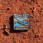 Rapid Bay embroidered travel patch with a long jetty above turquoise coastal water.