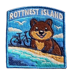 Rottnest Island embroidered travel patch with a quokka and an island beach with turquoise water; photographed on a transparent background.