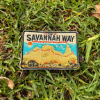 Savannah Way embroidered travel patch with a four-wheel drive travelling a red dirt road across northern Australia.