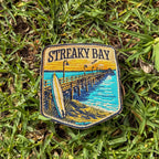 Streaky Bay embroidered travel patch with a sandy coastline and turquoise water.