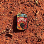 Undara Lava Tubes embroidered travel patch with a lava tube cave opening in an outback landscape.