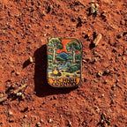 Victorian High Country embroidered travel patch with a four-wheel drive climbing a steep alpine dirt track.